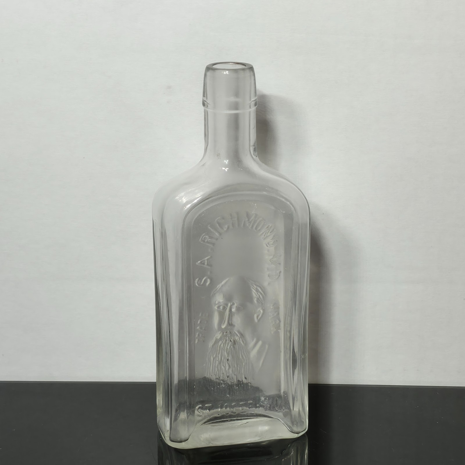 Antique 1880s Dr S.A. Richmond Nervine Bottle Embossed Portrait St Joseph