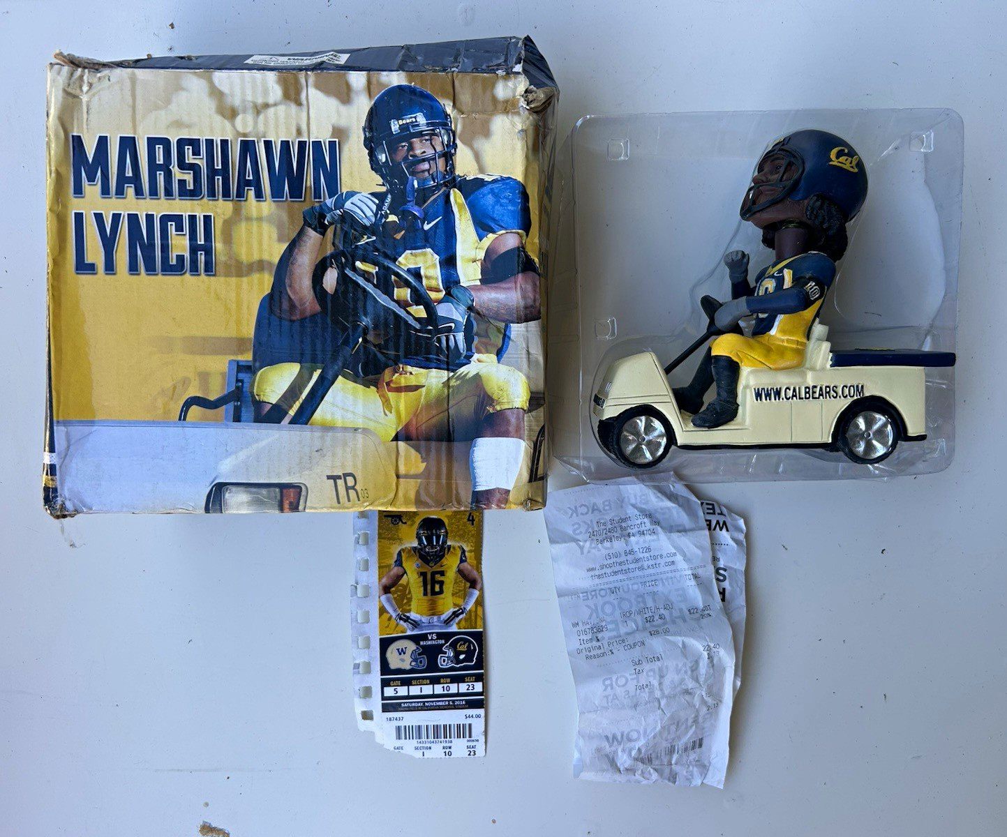 Forever Collectibles Marshawn Lynch Football Bobblehead Figure Golf Cart