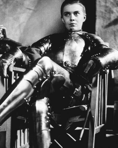 Jean Seberg in suit of armor seated on set 1957 Saint Joan 24x36 Poster