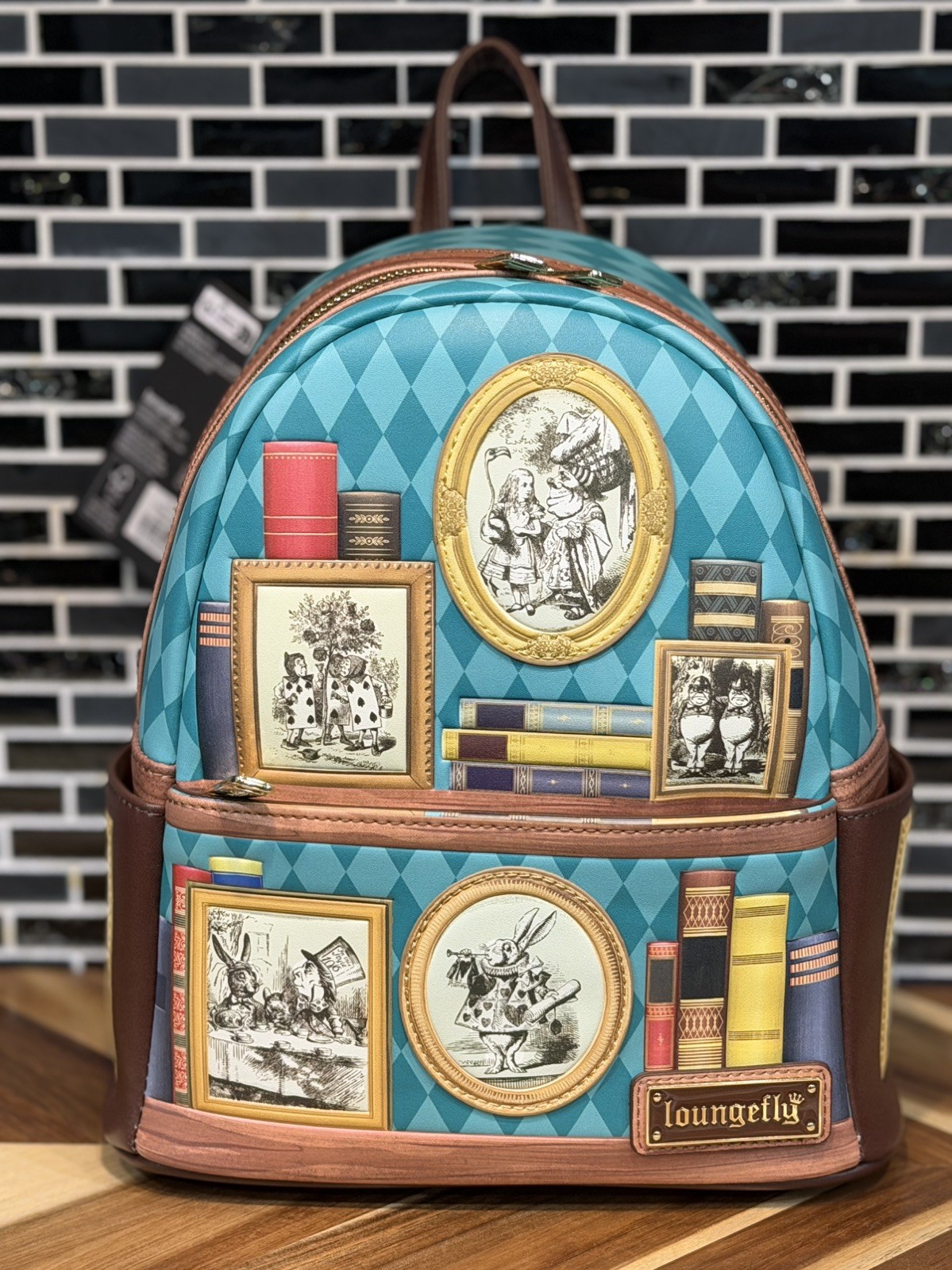 Loungefly Alice in Wondeland frames and books mini backpack BAM exclusive 