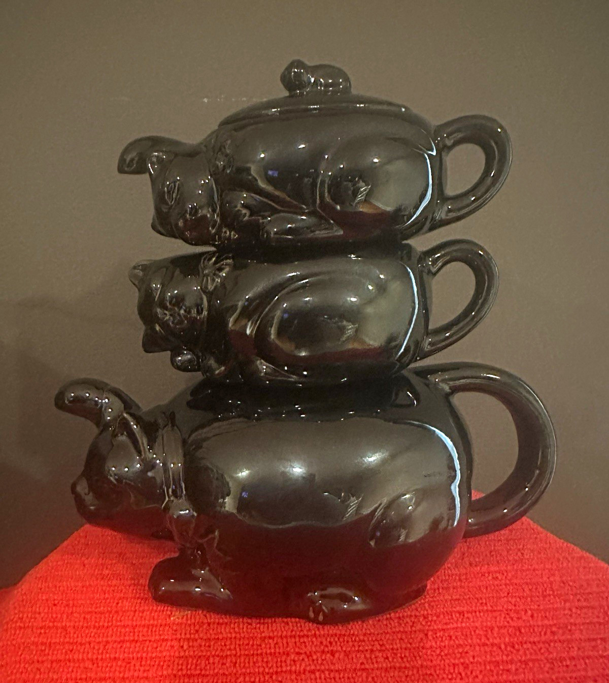 Vintage 1950’s Stacking Black Cat 3 piece tea set made of gloss redware ceramic.