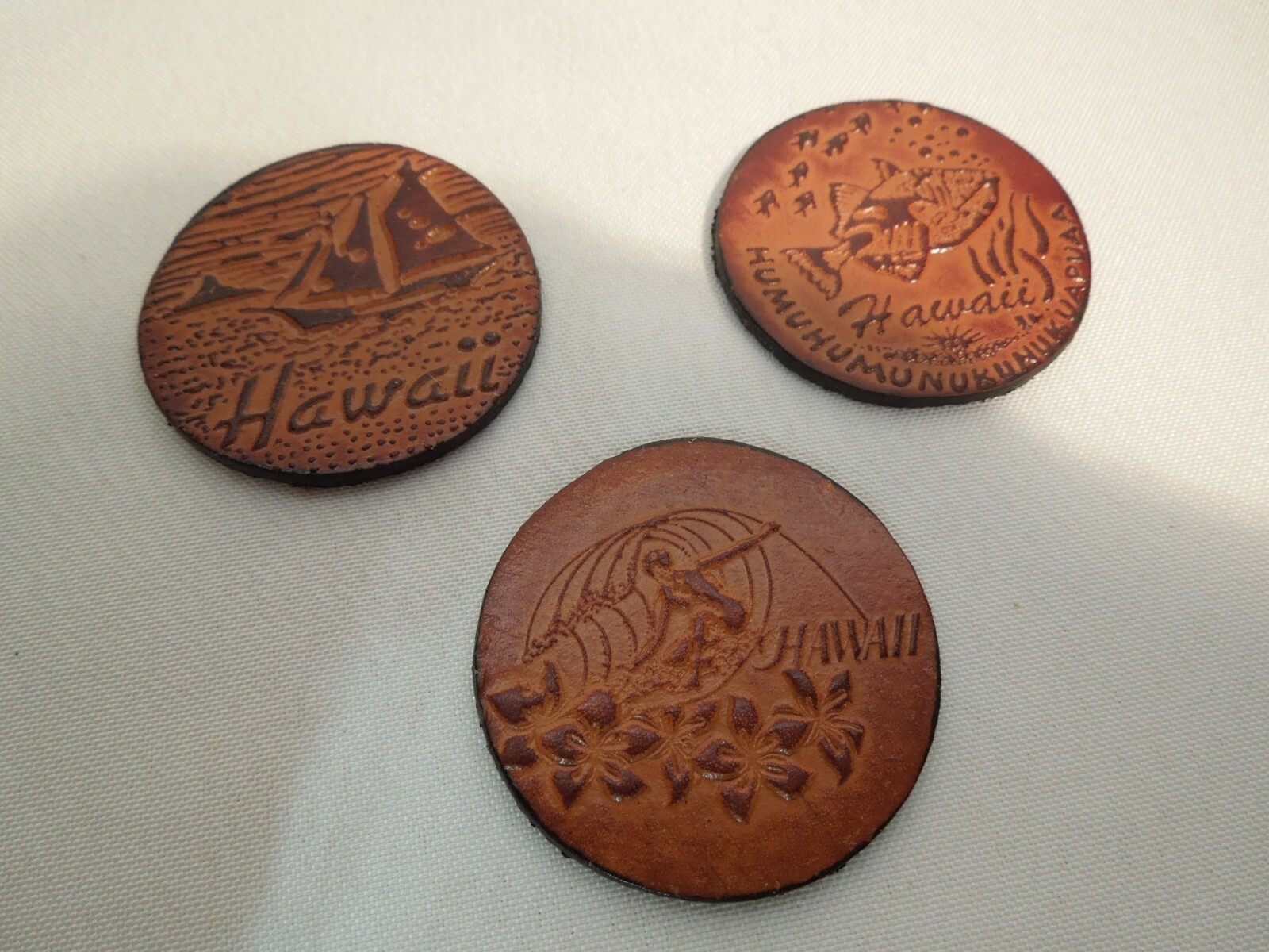 Lot of 3 Vintage Hawaiian Leather Pogs Trigger Fish, Sailboat, Surfing