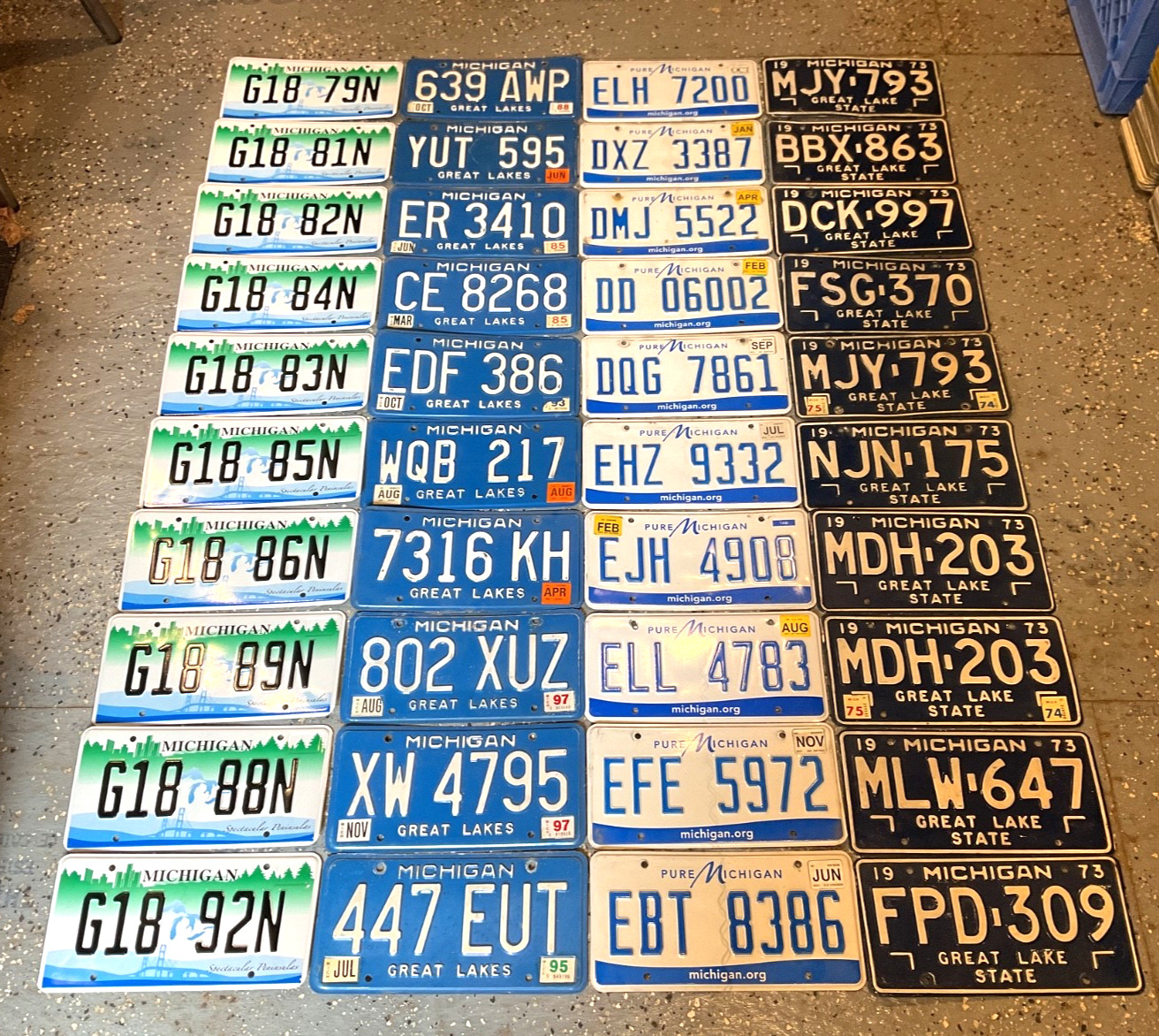 RARE LOT OF 40 MICHIGAN LICENSE PLATES 1973 BLUE BASE SPLENDOR ETC RESELL CRAFT