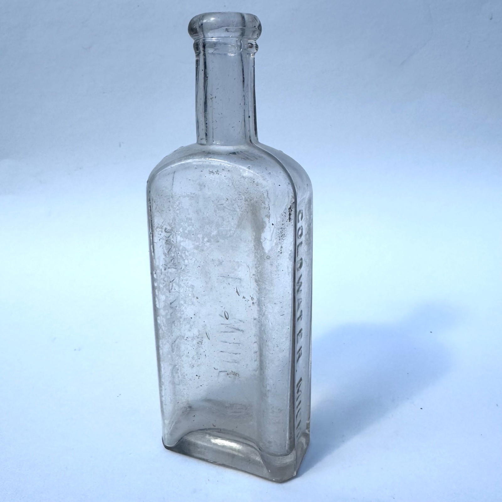 Clear-to-subtle SCA Warner’s White Wine & Tar Syrup Coldwater Michigan Bottle