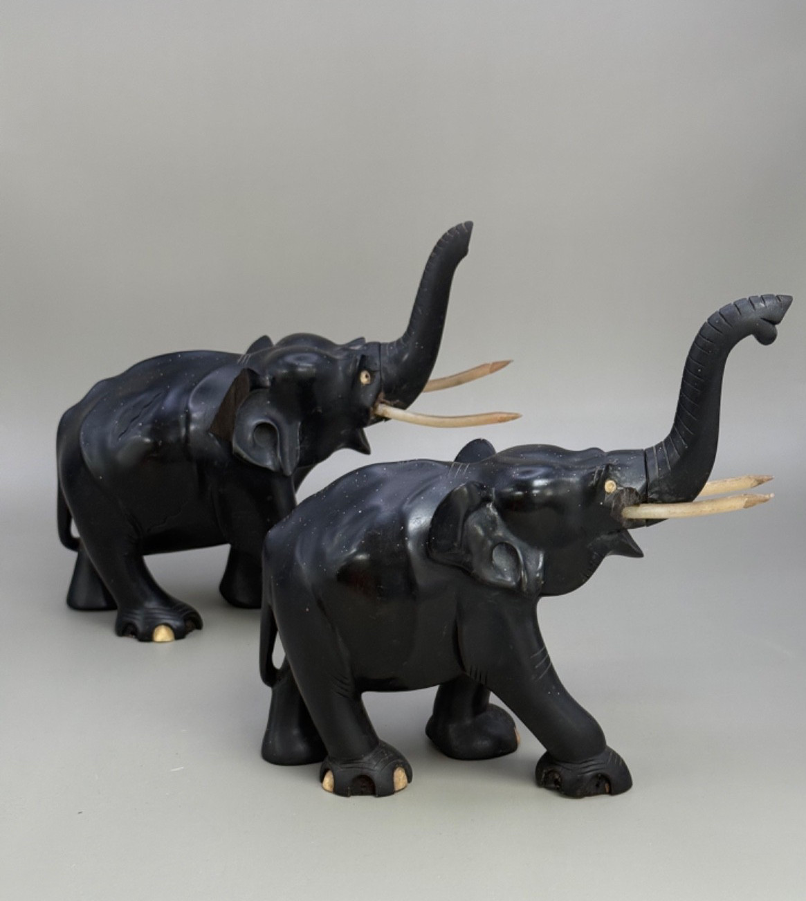 2 Antique Beautifully Hand Carved Ebony Elephants in need of repair Trunks up
