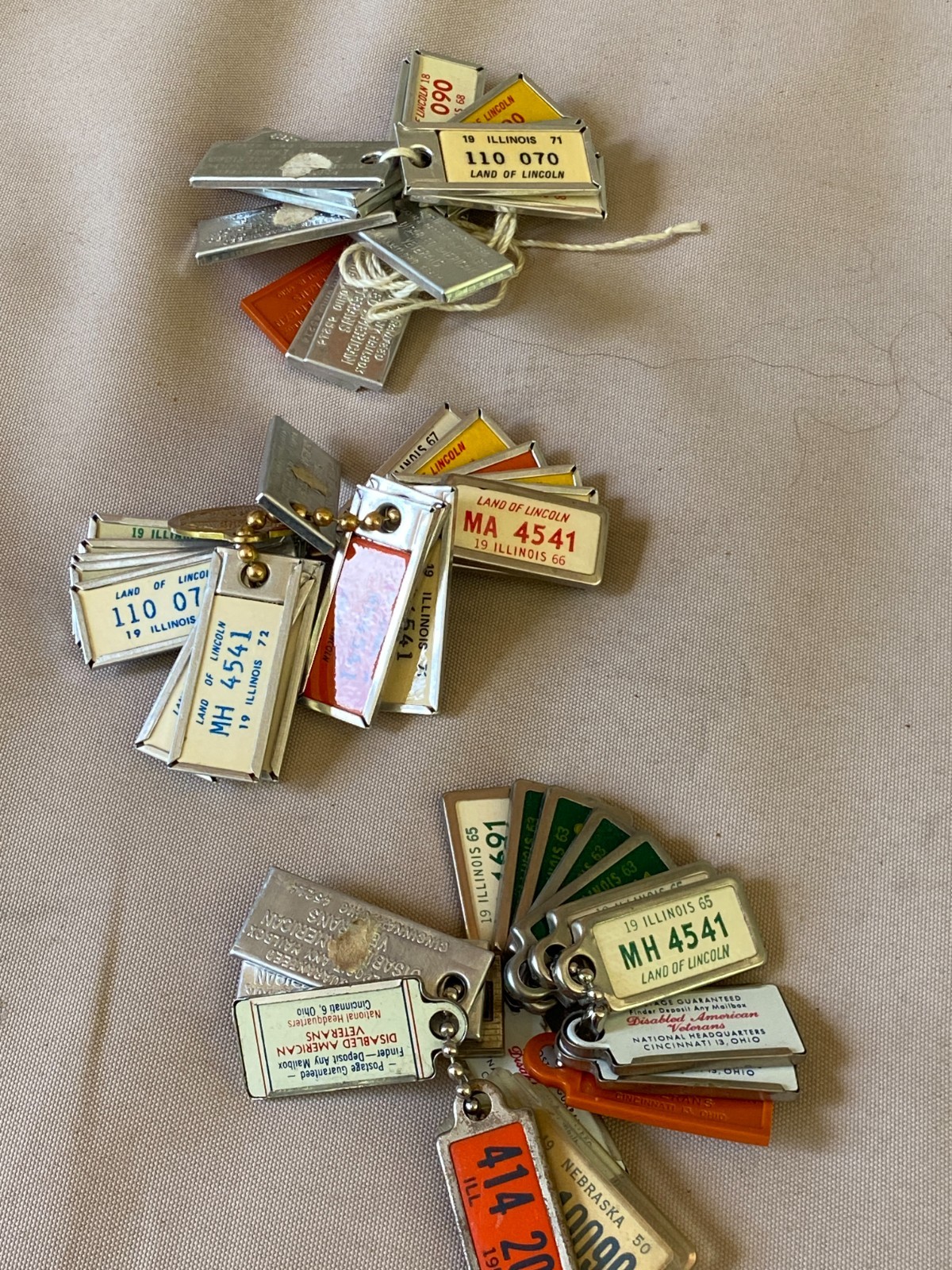 Vintage rings of Illinois DAV Mini License Plate Keychain over 50 Piece Set