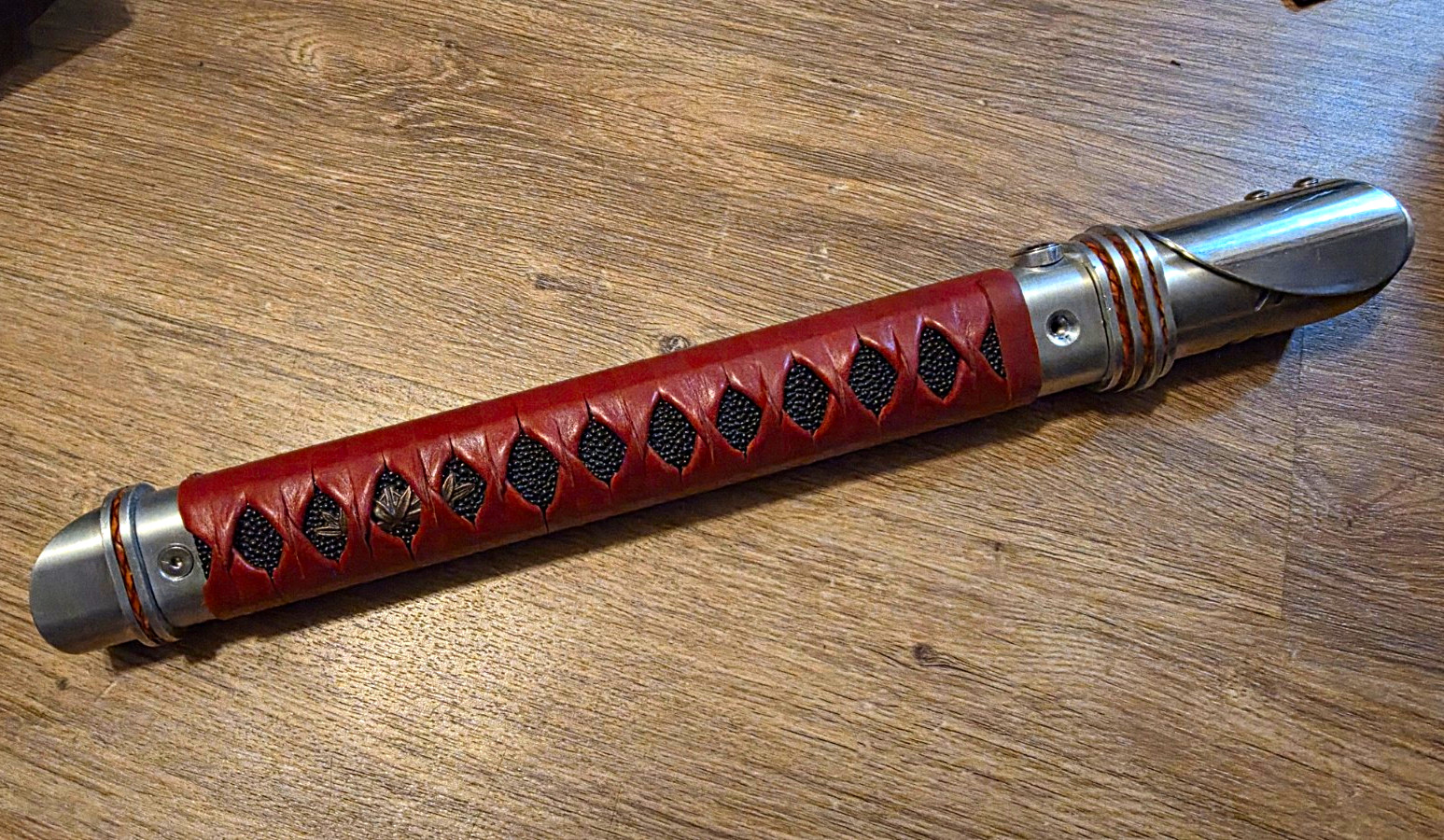 Custom lightsaber. featuring CFX Neopixel soundboard. custom 3d printed chasis.