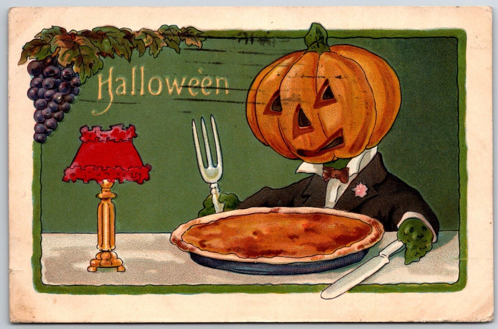 Halloween Greetings JOL MAN EATING PUMPKIN PIE Embossed L&E Postcard Fantasy