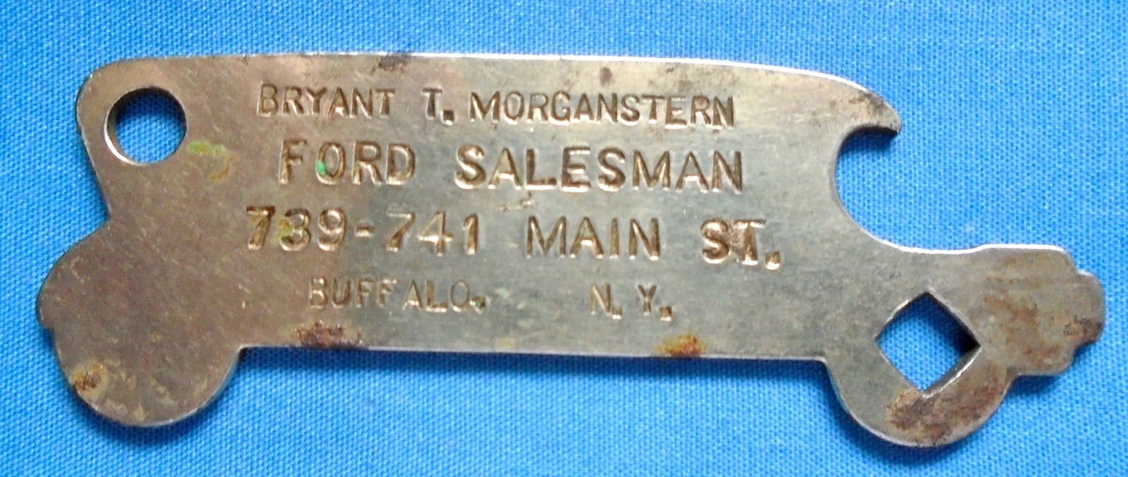 VTG FORD SALESMAN CAR SHAPE BOTTLE OPENER KEYCHAIN BUFFALO, N.Y.