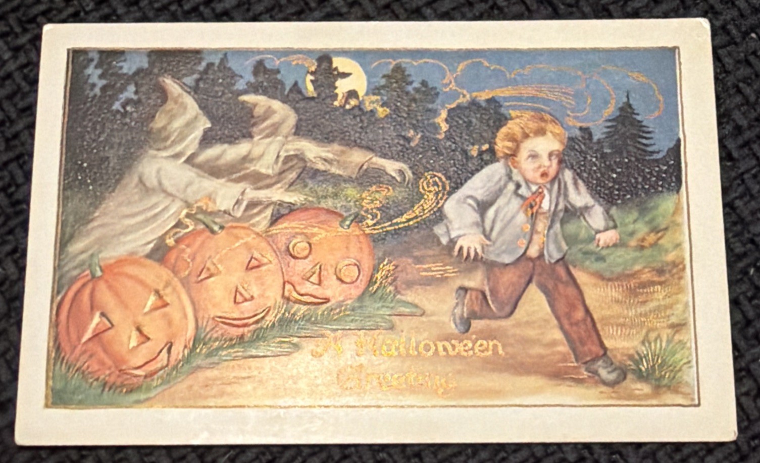 Post Card - Vintage Halloween - JOL Smiling, Young Boy Scared by Ghosts