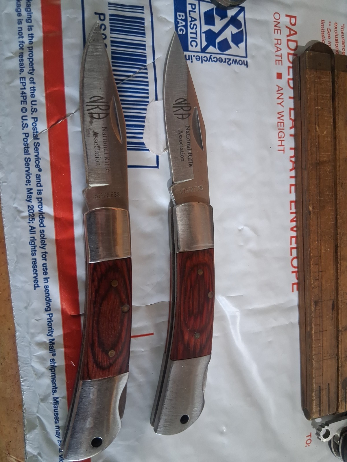 2 Unbranded NRA marked Lockback Knifes