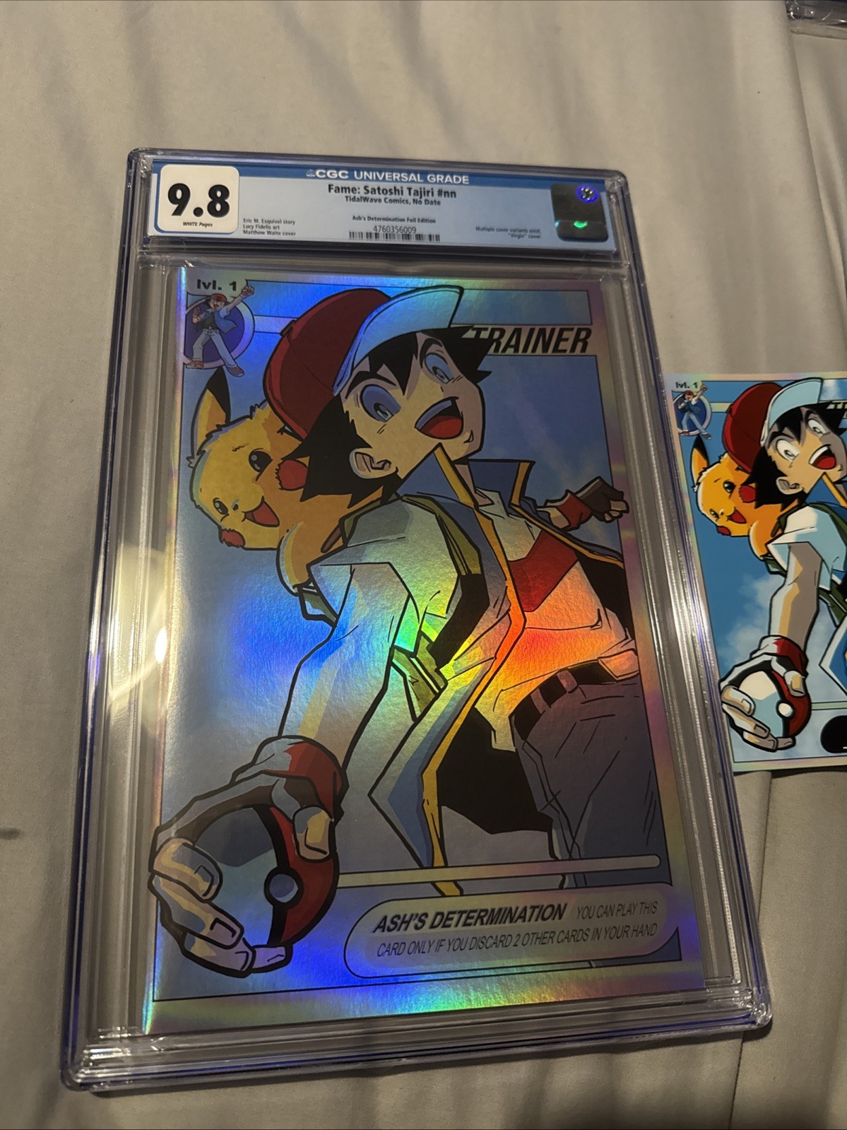 FAME: SATOSHI TAJIRI CGC 9.8 ASH’S DETERMINATION FOIL POKEMON #13/151 COA