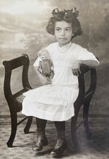 Cute Little Girl Big Brown Eyes Holding Small Bisque Doll Antique Vintage Photo picture