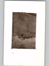 c1915 Cute Dog In Snow Old House RPPC Real Photo Postcard picture