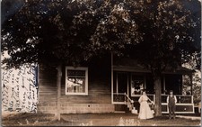 1908 RPPC Burlington Home, Couple, Charlotte Michigan Addressed Postcard picture