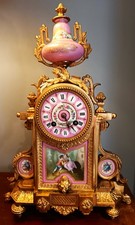 ANTIQUE FRENCH GILT AND PORCELAIN MANTEL CLOCK. picture