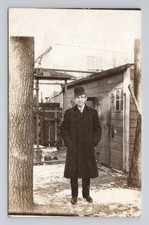 Antique RPPC c. Early 1900s Dapper Man Bowler Hat Long Winter Overcoat Snow picture