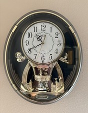 Rhythm Hummingroad  Small World Musical Motion Clock 4MH735UR08 NIB Quartz picture