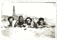 OIL DERRICKS HUNTINGTON BEACH Vintage Photo People Sunbathing Next to Oil Tower picture