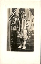 Patriotic little girl Decked Out American Flag Outfit c1910s RPPC Postcard bhn picture
