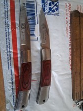 2 Unbranded NRA marked Lockback Knifes picture